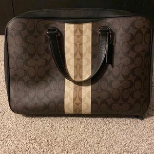 Coach Signature Briefcase in brown and tan.